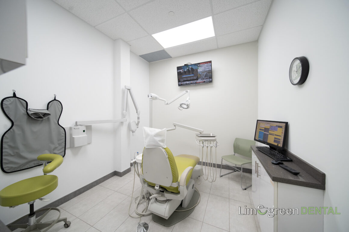 Comfortable treatment room with digital x-ray equipment and a lime green chair at Limegreen Dental on Hamilton Mountain