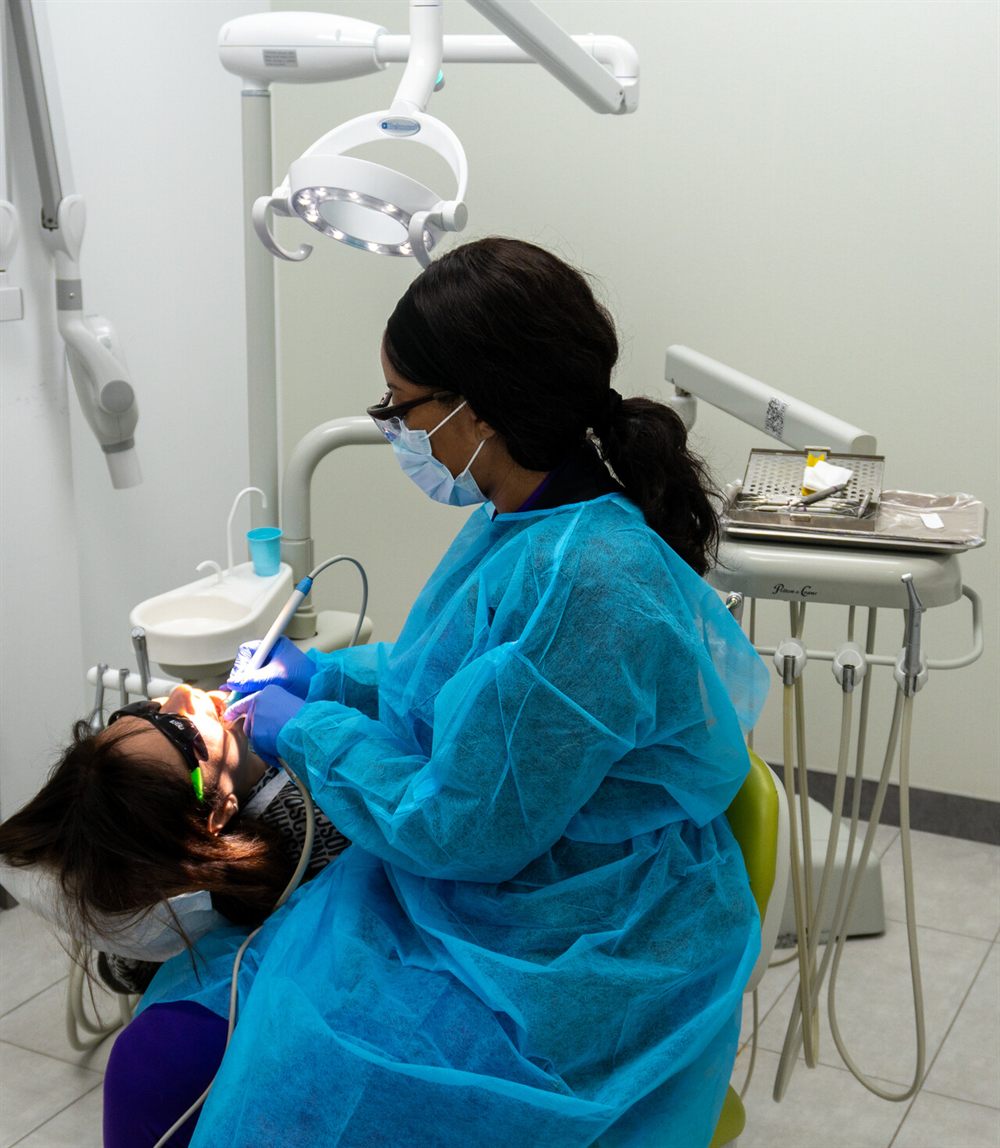 Limegreen Dental clinician caring for a patient during treatment in Hamilton