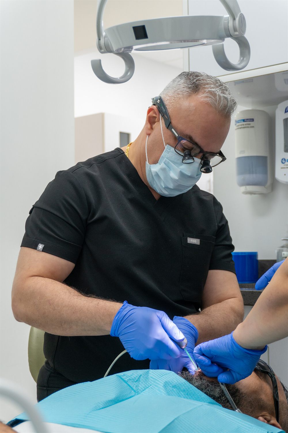 Limegreen Dental dentist treating a patient at the Hamilton Mountain clinic